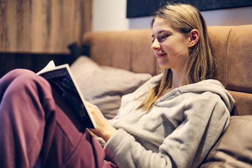 Teenage girl enjoying reading a book in bed
Shot with Canon R5