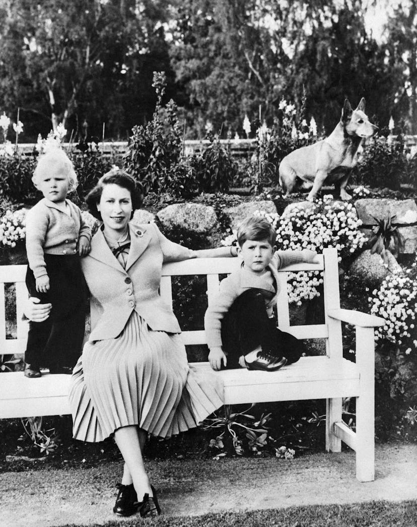 Queen Elizabeth with her oldest two children in 1952.