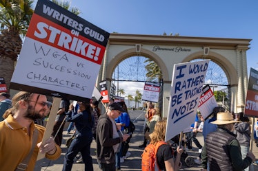 LOS ANGELES, CA - MAY 02: People picket outside of Paramount Pictures on the first day of the Hollyw...