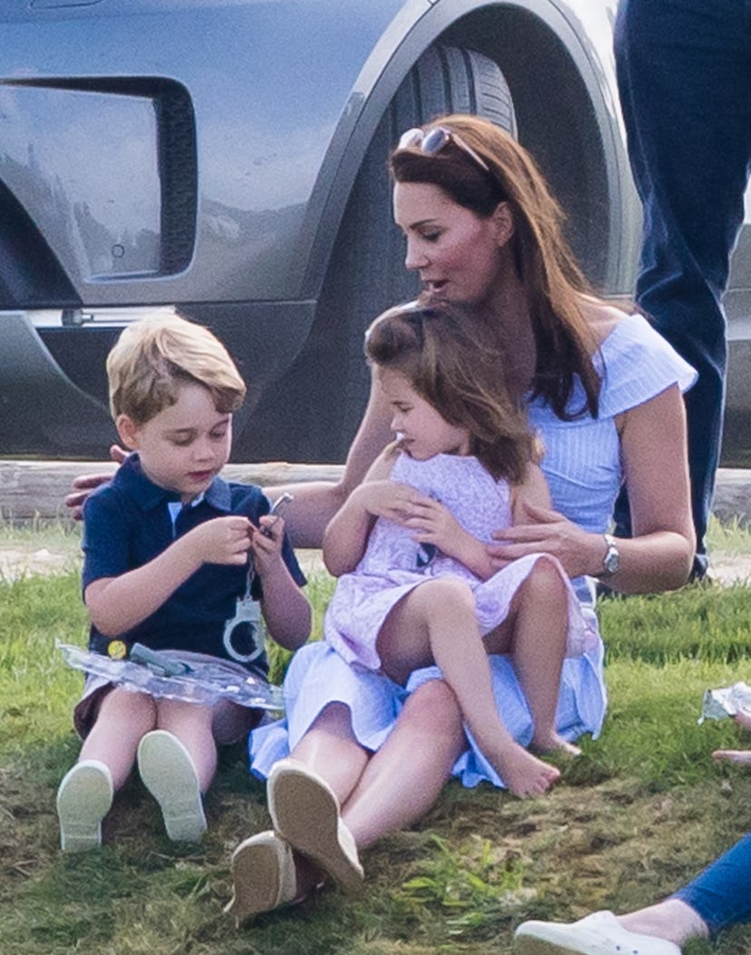 Kate Middleton plays with her kids at a polo match in 2018.