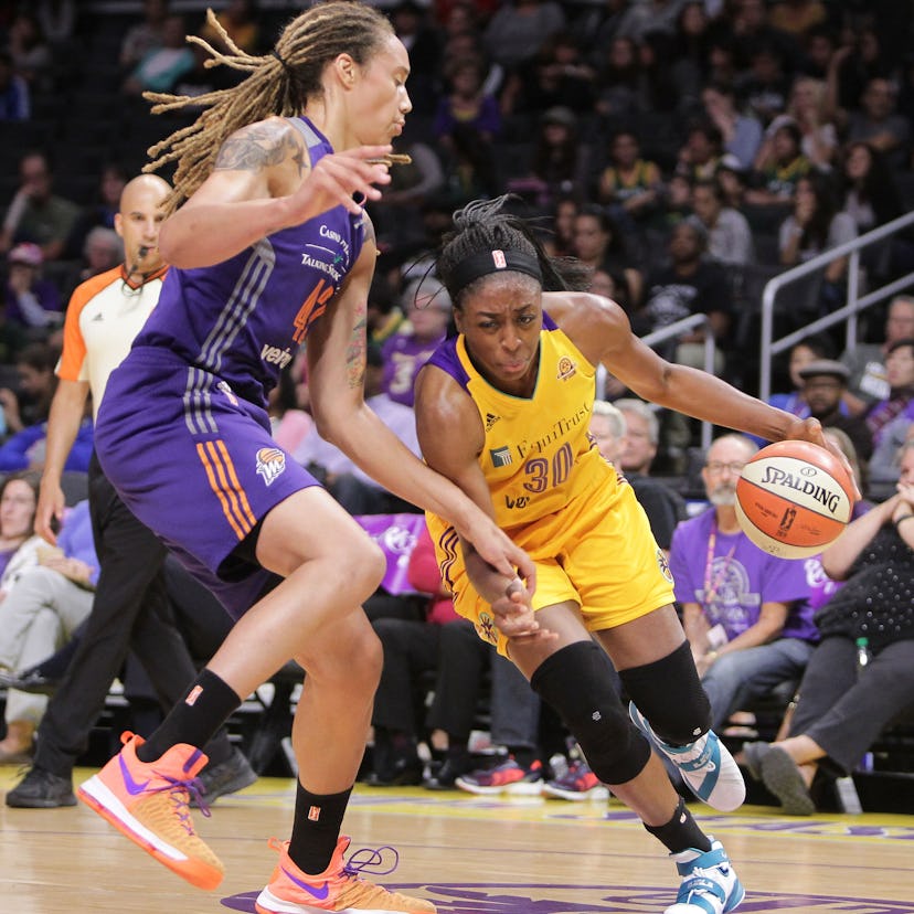 In a 2016 game for the WNBA, Brittney Griner (Phoenix Mercury) faces off against Nneka Ogwumike.