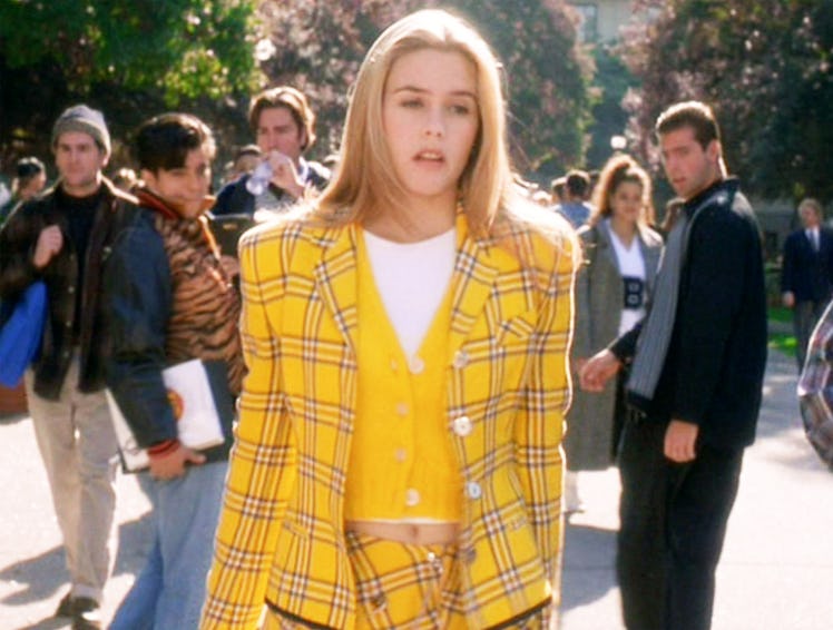 Alicia Silverstone wears a yellow skirt suit as Cher Horowitz in the film "Clueless." 