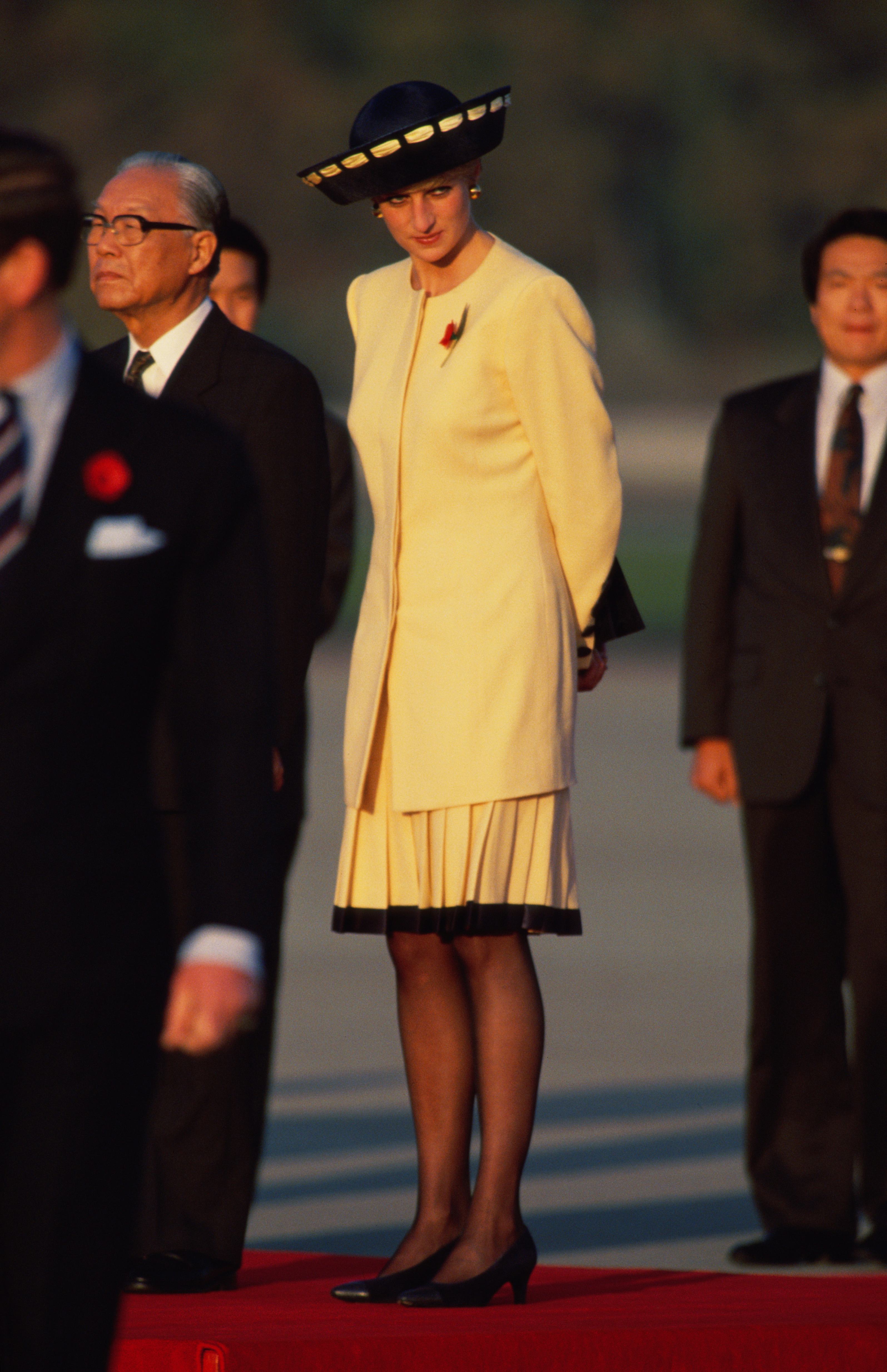 Princess Diana (1961 - 1997) wearing a Catherine Walker suit at an arrival ceremony at Seoul Air Bas&hellip;