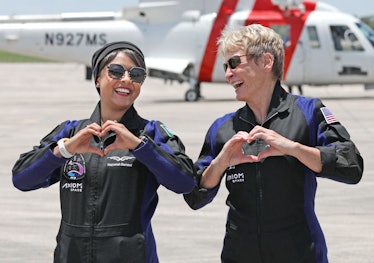Axiom Mission 2 mission specialist Rayyanah Barnawi, of Saudi Arabia (L), and commander and former N...