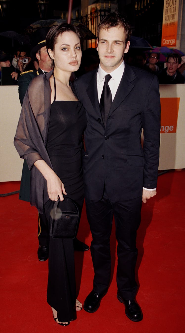 Angelina Jolie & Jonny Lee Miller Attend The Bafta British Academy Film Awards 