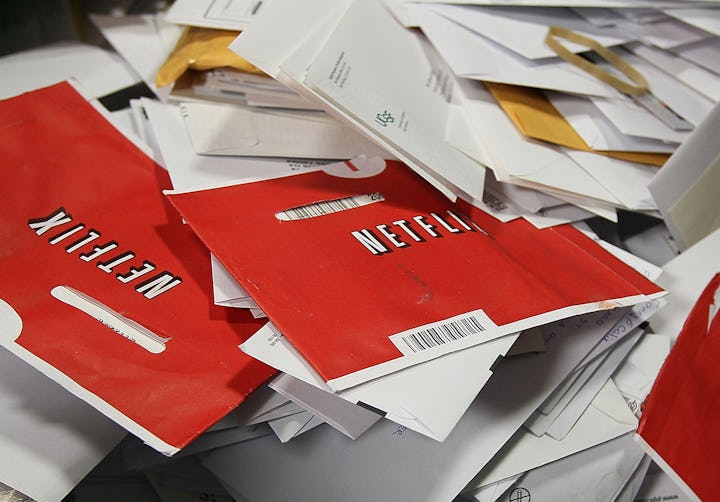 SAN FRANCISCO - MARCH 30:  Red Netflix envelopes sit in a bin of mail at the U.S. Post Office sort c...