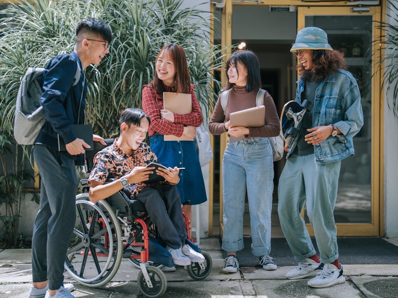 Asian College students bonding time in campus outdoor after class