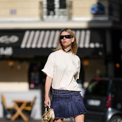 PARIS, FRANCE - APRIL 15: Natalia Verza wears black futurist sunglasses, a black ribbon with a silve...