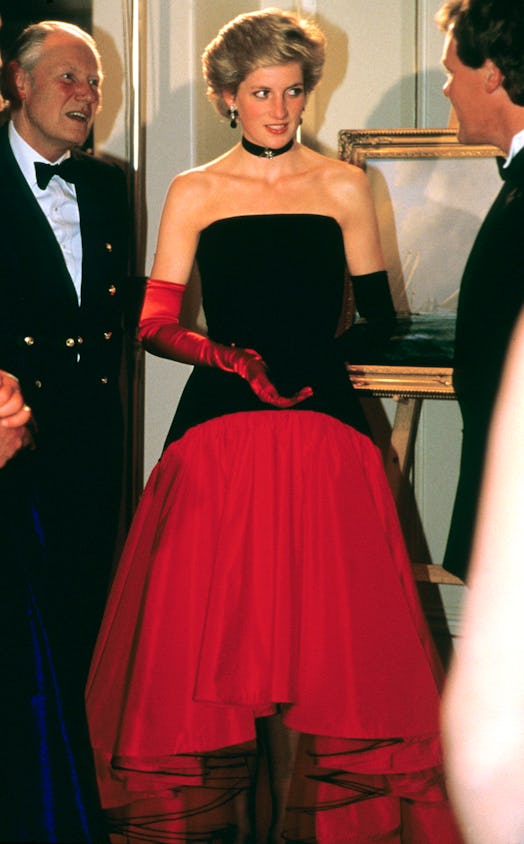 LONDON, ENGLAND - SEPTEMBER 19: Diana, Princess of Wales, wearing a red taffeta and black velvet Fla…