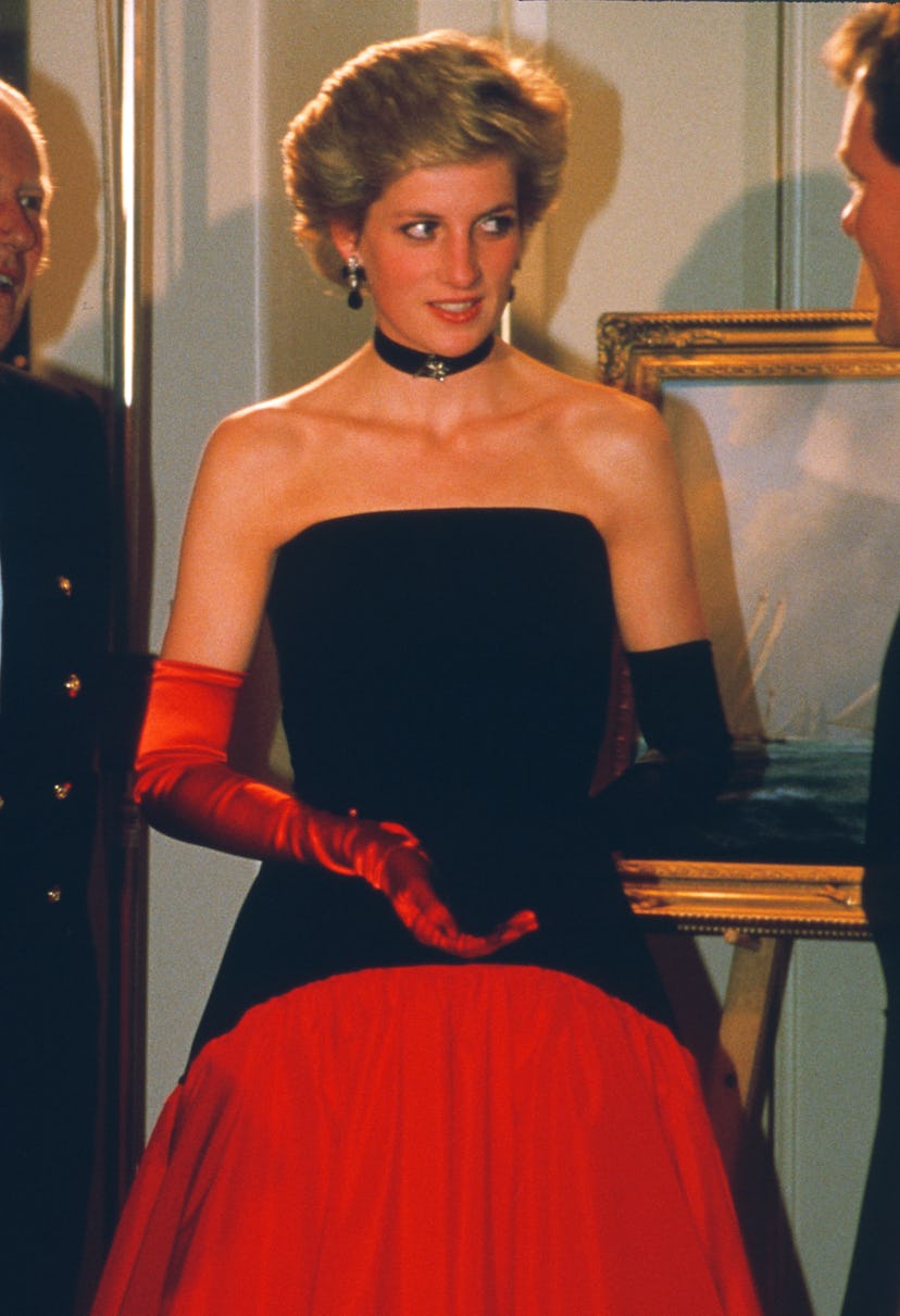 Diana, Princess of Wales, wearing a red taffeta and black velvet Flamenco ball gown designed by Murr...