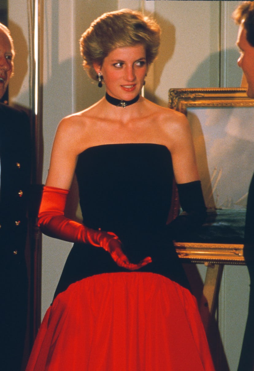 Diana, Princess of Wales, wearing a red taffeta and black velvet Flamenco ball gown designed by Murr...