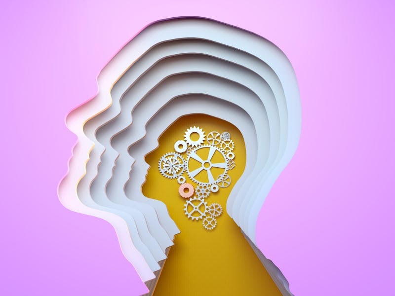 Digital generated image of multi layered head silhouette with gears inside on yellow background.