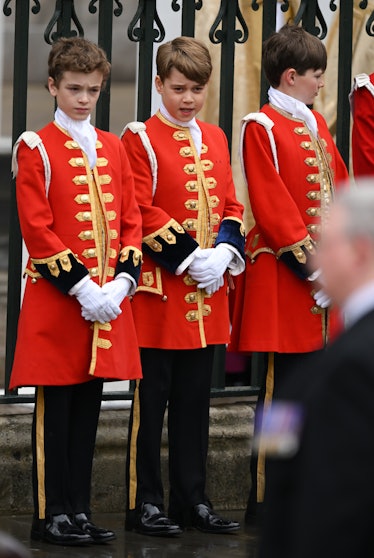 LONDON, ENGLAND - MAY 06: Prince George of Wales (C) arrives at Westminster Abbey for the Coronation...