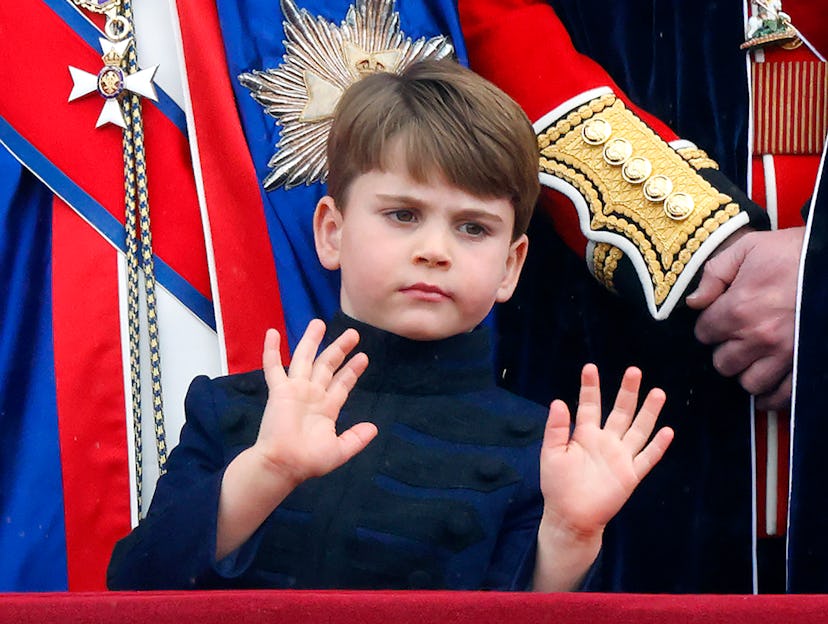Prince Louis looks like he doesn't want his picture taken.