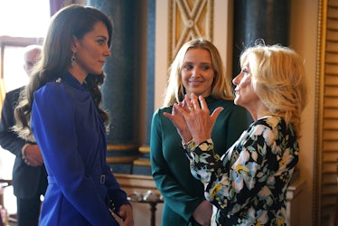 Britain's Catherine, Princess of Wales (L) speaks with US First Lady Jill Biden (R) and her grand da...