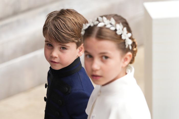 LONDON, ENGLAND - MAY 06: Prince Louis and Princess Charlotte arrive ahead of the Coronation of King...