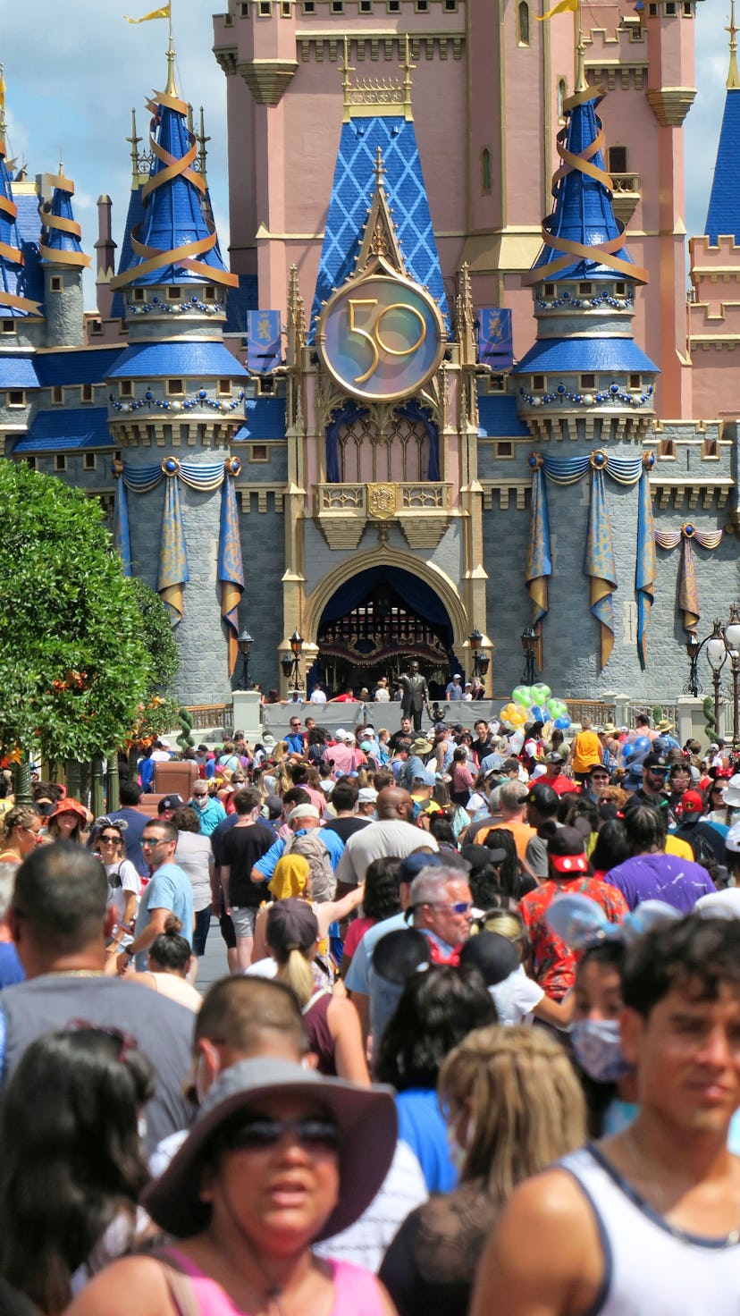 Visitors crowd Main Street USA in the Magic Kingdom at Walt Disney World on Wednesday, August 18, 20...