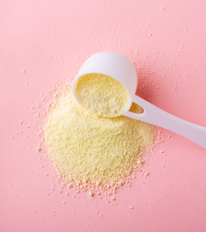 powdered baby formula on a pink surface, in an article about freeze-dried breast milk