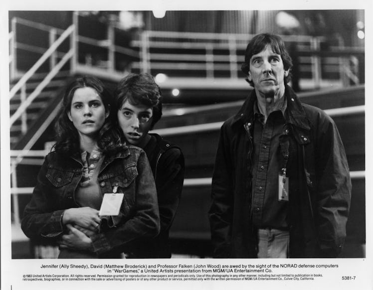 CIRCA 1983: Ally Sheedy, Matthew Broderick and John Wood watch the NORAD defense computers in a scen...