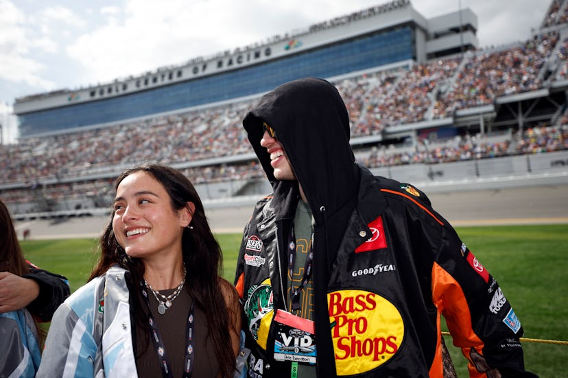 DAYTONA BEACH, FLORIDA - FEBRUARY 19: Pete Davidson and Chase Sui wait on the grid prior to the NASC...
