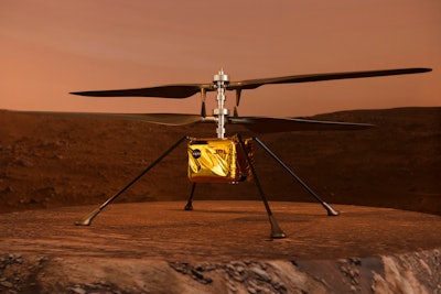 TOPSHOT - A full scale model of the experimental Ingenuity Mars Helicopter, which will be carried un...