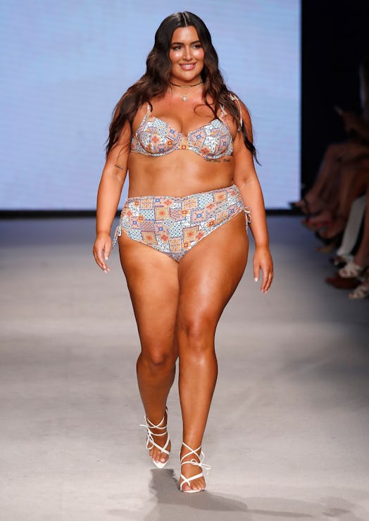 plus-size model walks the runway for kittenish during Paraiso Miami Swim Week 2023 in a bikini