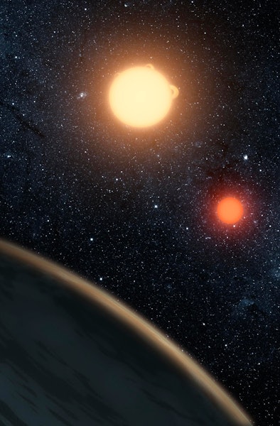 This artist's concept illustrates Kepler-16b, the first planet known to definitively orbit two stars...