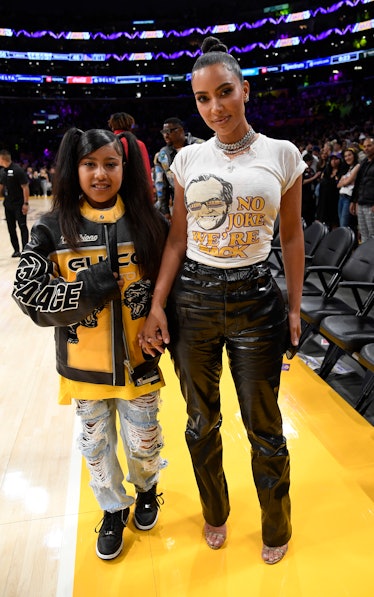Kim Kardashian and daughter North West attend the the Western Conference Semifinal Playoff game