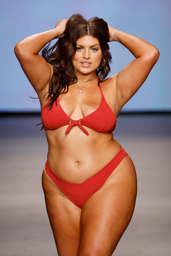 Plus-size model Ella Halikas walked for kittenish at Paraiso Miami Swim Week 2023 in a red bikini.