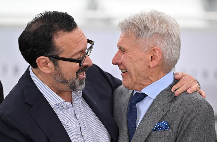 CANNES, FRANCE - MAY 19: US director James Mangold (L) and US actor Harrison Ford (R) pose during a ...