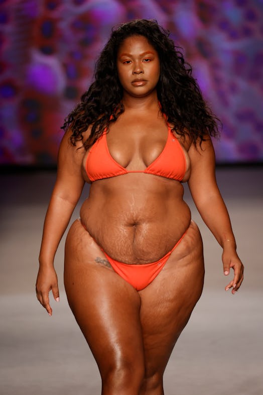 A plus-size model walks the runway for Natasha Tonic Fashion Show during Paraiso Miami Swim Week 202...