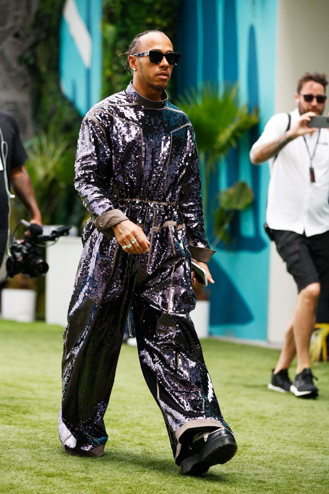 MIAMI, FLORIDA - MAY 07: Lewis Hamilton of Great Britain and Mercedes walks in the Paddock prior to ...