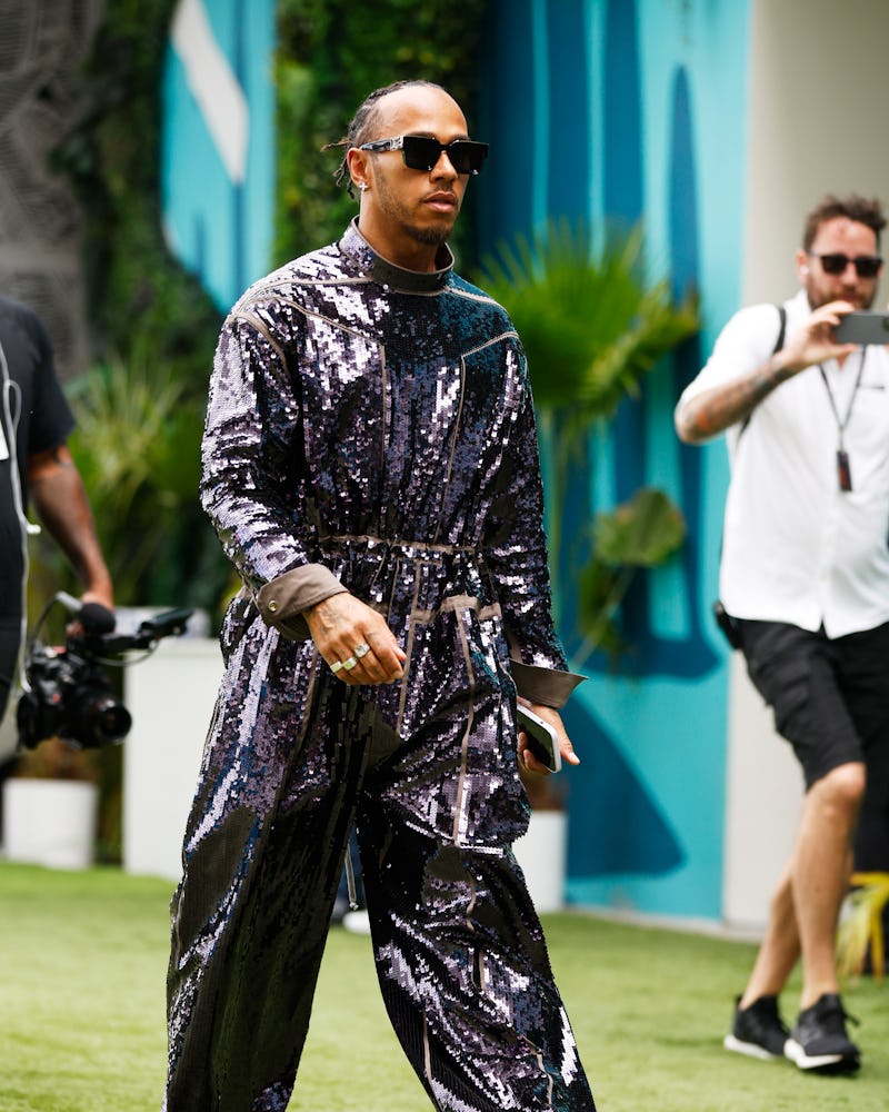 MIAMI, FLORIDA - MAY 07: Lewis Hamilton of Great Britain and Mercedes walks in the Paddock prior to ...