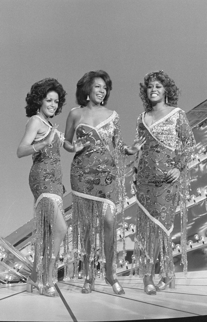 The Supremes in embellished dresses while performing on The Sonny & Cher Comedy Hour. 