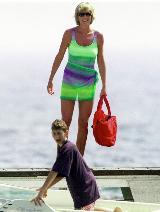 Princess Diana wearing a neon one-piece swimsuit.