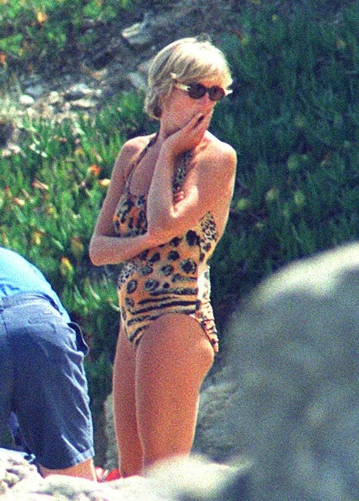 Princess Diana in a leopard print swimsuit.