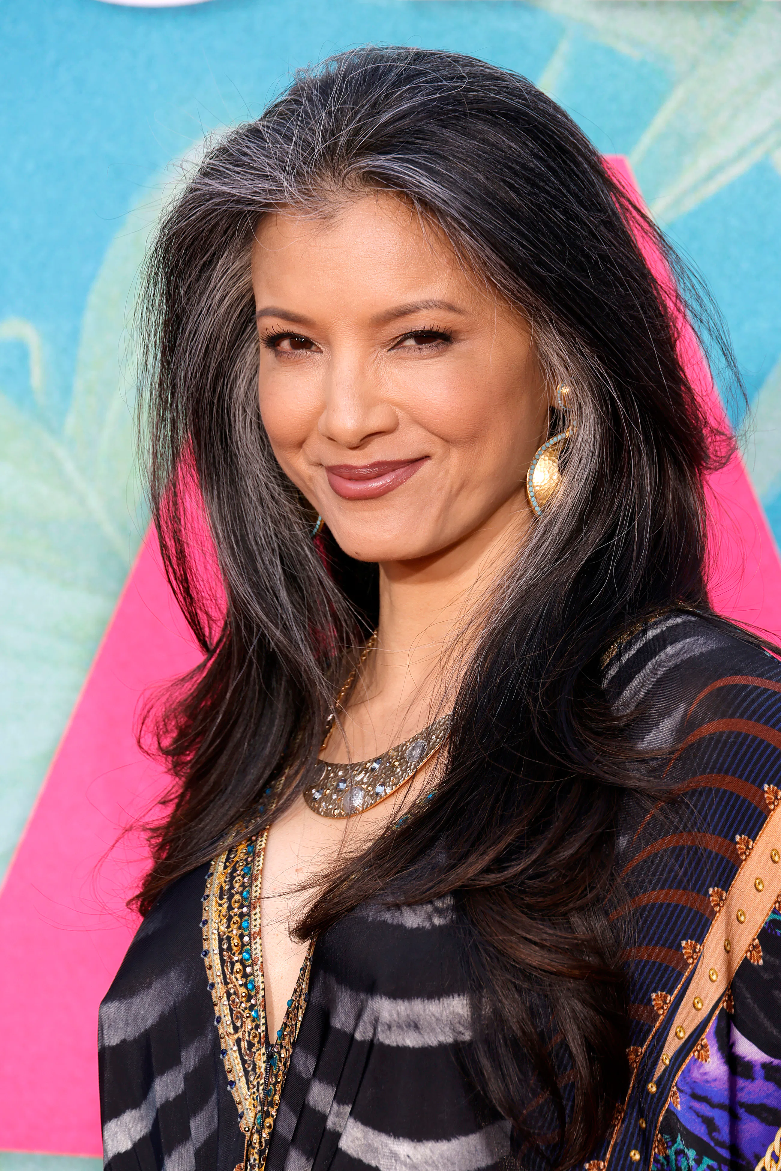 Kelly Hu long gray hair in voluminous blowout