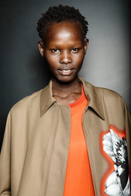 MILAN, ITALY - JUNE 16: Model Shanelle Nyasiase is seen backstage ahead of the Neil Barrett show dur...
