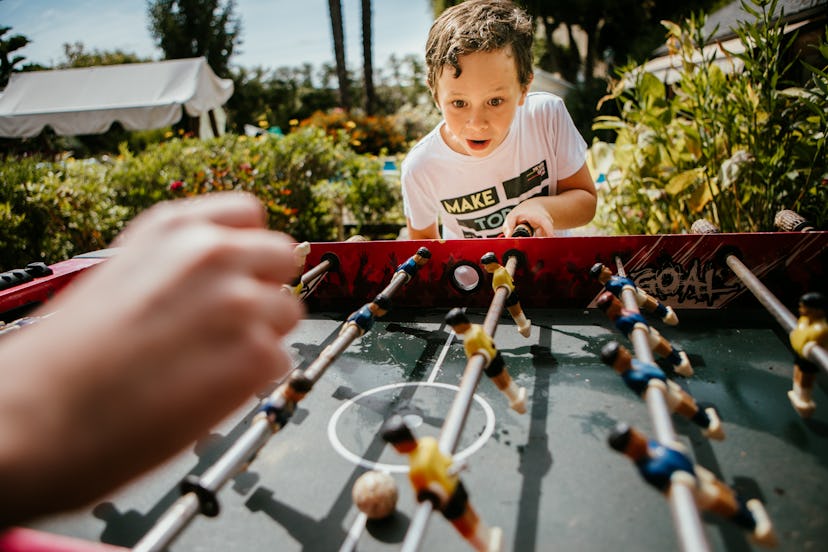 Foosball is a competitive and fun father's day game to play 