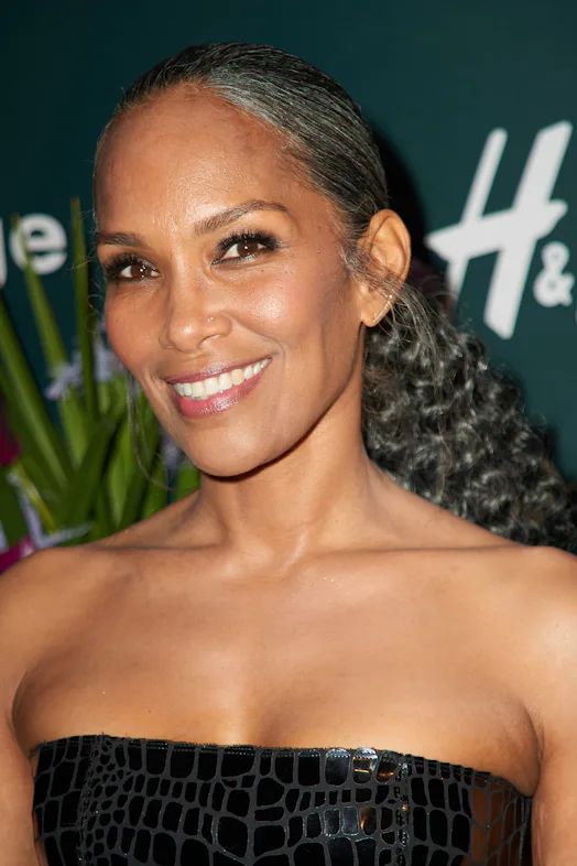 Mara Brock Akil attends silver curls in half-up ponytail