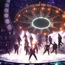 NEW YORK, UNITED STATES:  Will Smith performs his hit song "Men in Black" as a space ship lands on t...