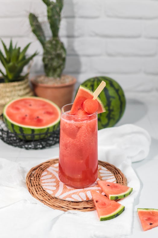 Fresh Watermelon Juice smoothie with fruit melon skewers