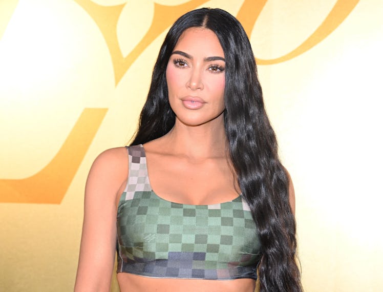 US socialite Kim Kardashian poses for a photocall at the Louis Vuitton Menswear Spring-Summer 2024 s...
