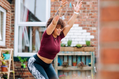 All the benefits of chair pose, the ultimate glute-strengthening yoga posture.