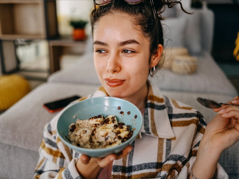 Portrait of a woman having breakfast