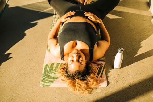 The best yoga pose for each zodiac sign, according to astrologers.
