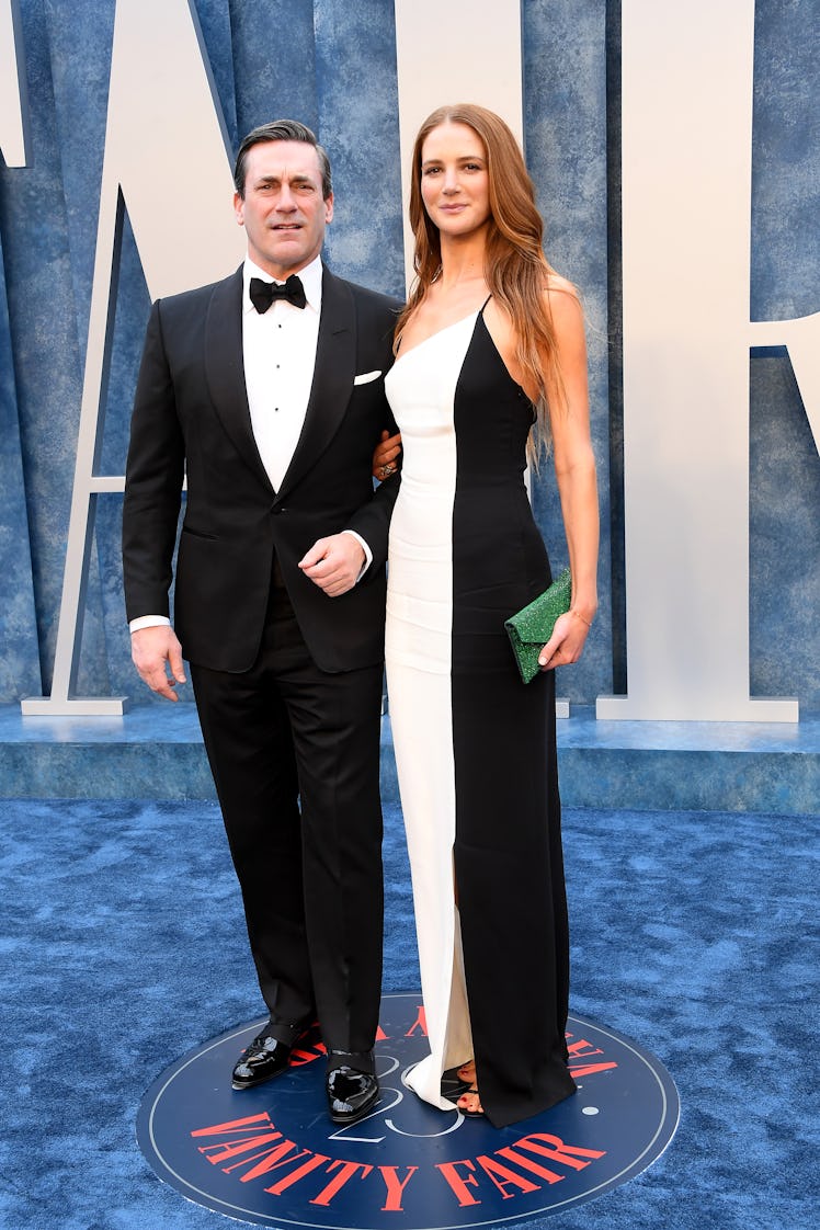 John Hamm and Anna Osceola arrives at the Vanity Fair Oscar Party.
