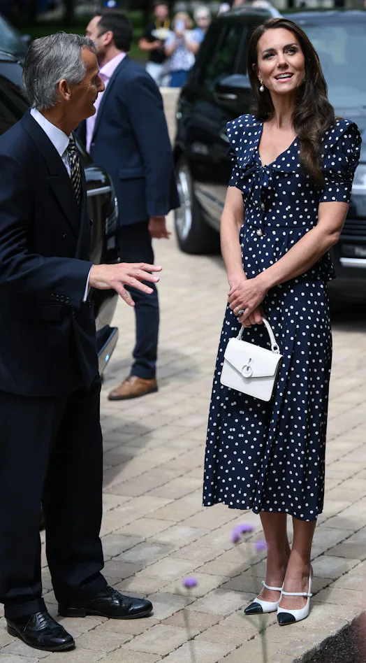 Kate Middleton Goes With a Navy and White Polka Dot For Appearance Kate Middleton Goes With a Navy and White Polka Dot For Appearance