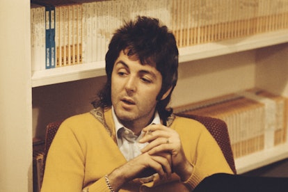 Singer-songwriter Paul McCartney of British rock group Wings, pictured smoking a cigarette in an off...