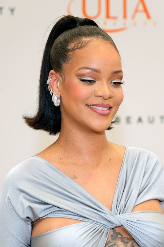 Rihanna silver cartilage piercings at Fenty Ulta launch